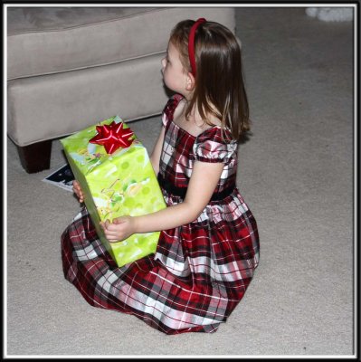 Noelle is impatient to start opening her Christmas Eve presents!
