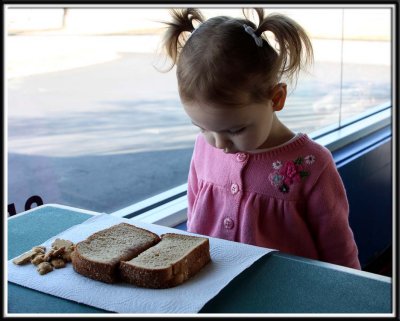 Kylie refuses to look at her food... maybe if I ignore it, it will go away!