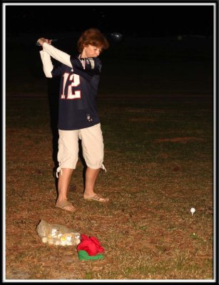 Charlotte hits a few into the pond too