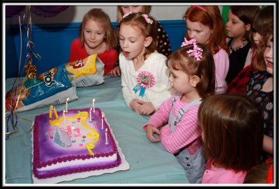 Noelle blows out her candles