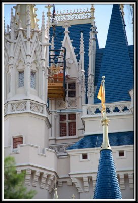 This basket hung from a giant crane. The person inside is hanging all the Christmas lights on the castle. They were up SOOO high