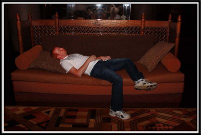 Brett collapses in the Animal Kingdom Lodge lobby to digest