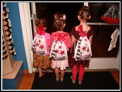 The girls get their accessory bags and head out the door lookin' all sparkly!