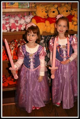 The girls went down to Disney clutching their spending money in their little fists... to buy the swords they've wanted for 2 yrs