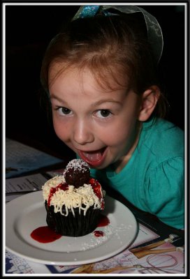 Noelle's Spaghetti cupcake. Noodle shaped frosting, chocolate meatball, and strawberry sauce