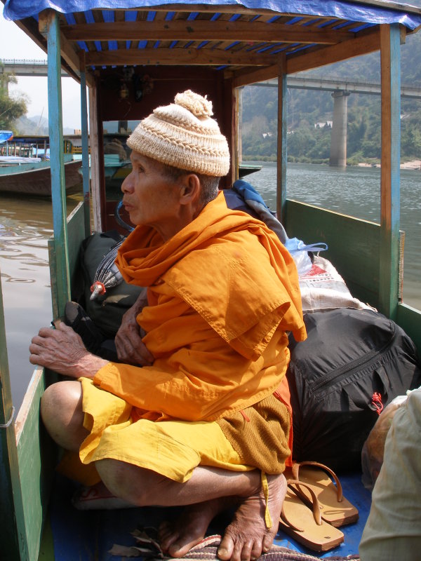 A Buddhist monk waiting for the boat to leave