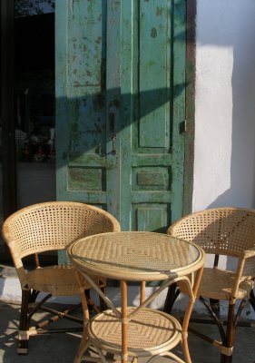 Cafe table and doors in main street