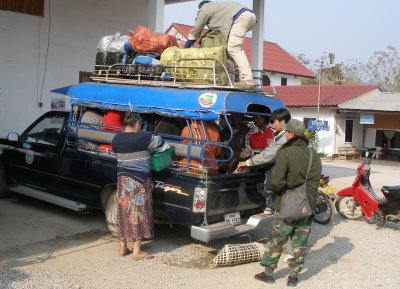 A sawngthaew being loaded for a journey