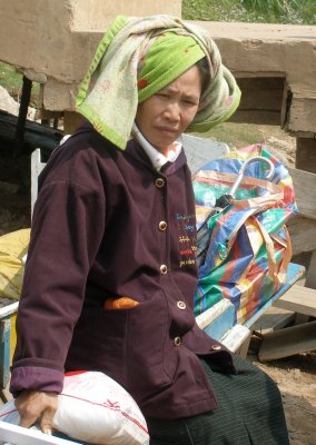 Local woman waiting for the boat