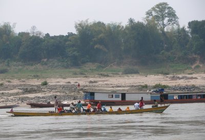 A small ferry crossing the river