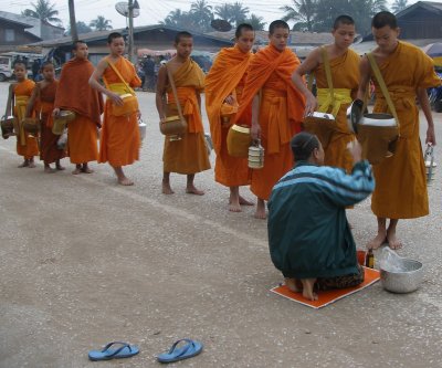 Next day, 7 a.m.: monks collecting alms