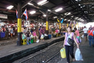 Market stalls on either side of platform