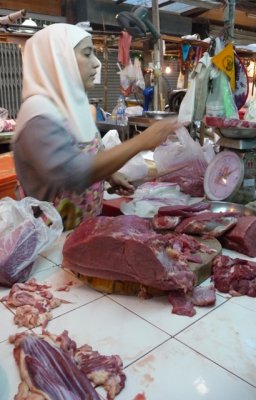 Woman selling meat