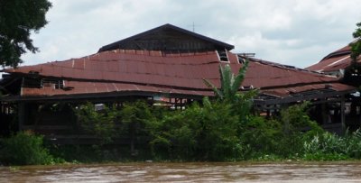 Derelict building on riverbank