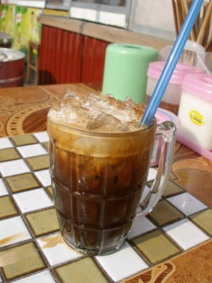 A final iced Lao coffee before flying home
