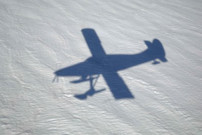Ski plane shadow, landing on Ruth Glacier, from plane-070309-Denali National Park, AK-#0269.jpg