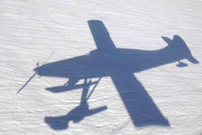 Ski plane shadow, landing on Ruth Glacier, from plane-070309-Denali National Park, AK-#0274.jpg