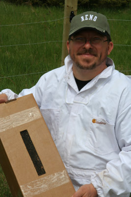 Me, holding up the nuke, a box full of bees including a queen.