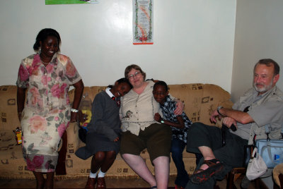 Val, Sarah, Grandma, Nyiva, Grandpa at Kenya High School visiting Sarah