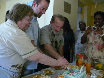 It is tradition in East Africa for the birthday guy to cut the cake along with his parents