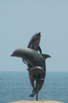 Dolphin statue along the Malecon