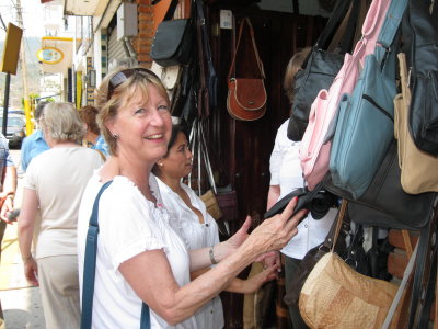 Linda goes shopping for leather goods