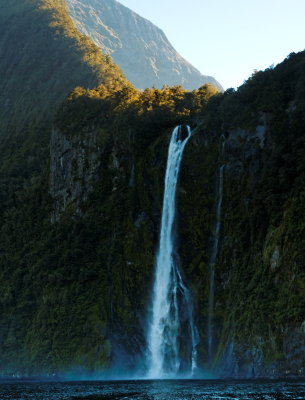 Waterfall out of a Hanging Valley along Milford Sound New Zealand