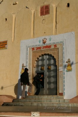 56-Fellow visitors enter temple
