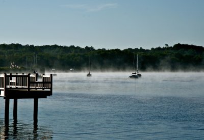 Boats in morning mist