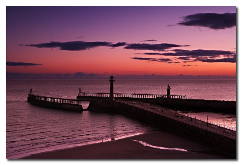 Muelles a la salida del sol  -  Piers at sunrise