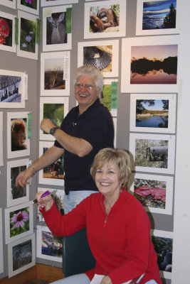 Hanging photos for the Heard Nature Photo Competition