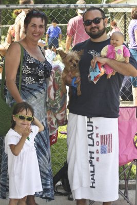 It was a fun day for the whole family... Mom, Dad, daughter, doll, and doggie!