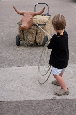 This little cowpoke roped him a steer!