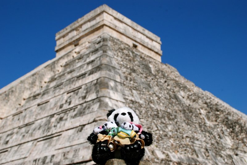 Pandas with the Pyramid of Kukulcan