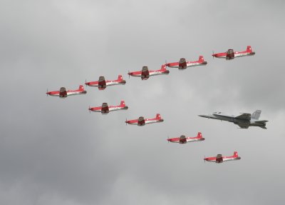 Swiss Pilatus formation with a Swiss F18 Hornet.jpg