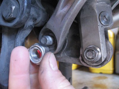 Remove lower tie rod nut