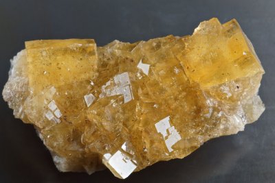 Very lustrous yellow fluorite in cubes to 15 mm, Great Sled Dale Mine, Keld, N Yorkshire.