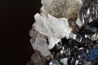 Strontianite crystals on fluorite with sphalerite, cerussite and chalcopyrite. Old Gang Mines, Reeth, Swaledale, N Yorkshire.