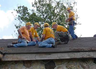 A DISCUSSION ABOUT HOW BEST TO REPAIR THE FRONT PART OF THE ROOF
