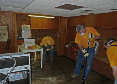 THE BASEMENT HAD BEEN FLOODED AND WAS FILLED WITH MOLD