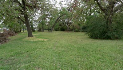 THE CHURCH'S FRONT YARD LOOKED MUCH BETTER WHEN WE LEFT!