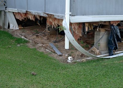 HURRICANE IKE ALSO DAMAGED THE MOBILE HOME'S SKIRTING