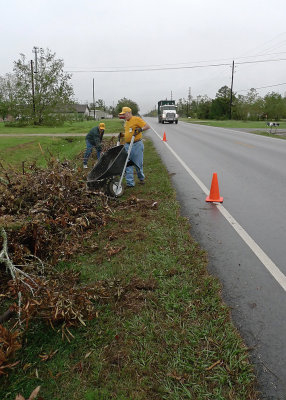 ONE OF MANY LOADS OF DEBRIS TAKEN TO THE ROADSIDE