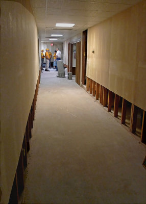 PORTIONS OF THE CHURCH'S INTERIOR WALLS AND INSULATION HAVE BEEN REMOVED TO PREVENT FURTHER MOLD GROWTH