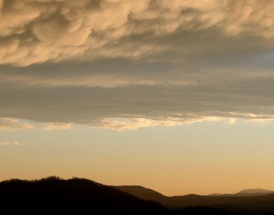 STORM CLOUDS AT SUNSET