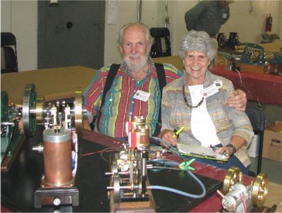 (100)   Carl  and Carole Felty  at their display.
