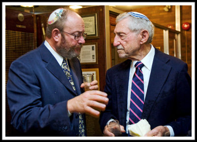 The Rabbi Mixes It Up With An Attentive Guest