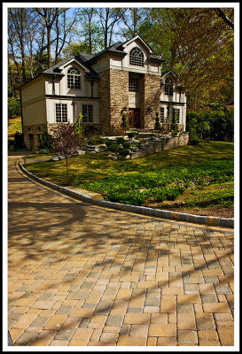 Tumbled Paving Stones Wind the Way to a  Stone Home
