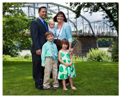 Family Photo by the River Bridge