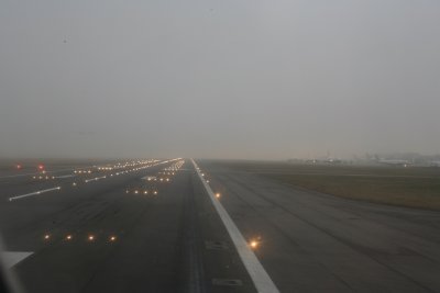Foggy departure from 27L at LHR